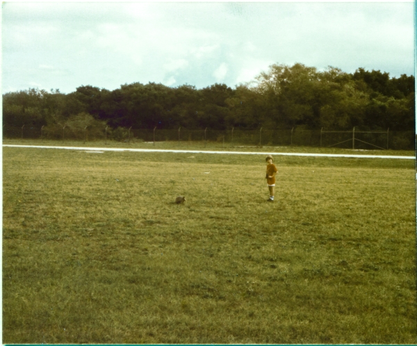 Kai MacLaren and an indigenous armadillo quietly consider one another on the grounds of the Air Force Space and Missile Museum, Cape Canaveral Air Force Station, Florida. Photograph by James MacLaren.